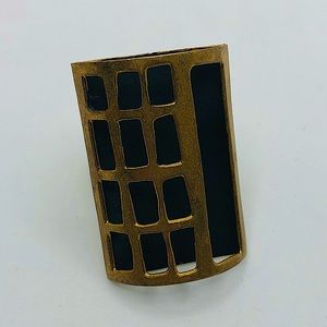 Black and gold square ring